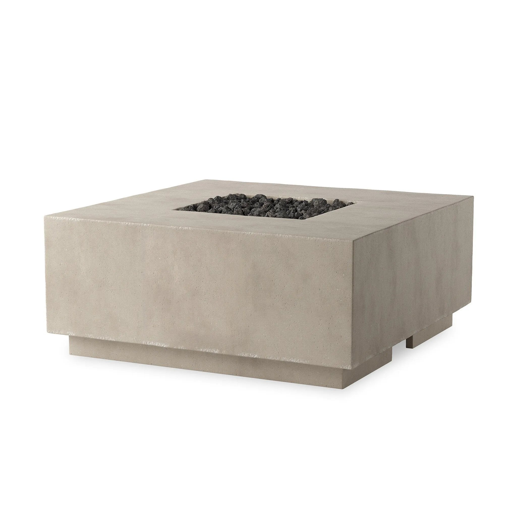 This outdoor fire table is a welcoming centerpiece designed for gathering. Made from glass-reinforced concrete, each piece is naturally finished with subtle tones of grey and cream. The monolithic shape is completed with lavastones in the center, bringing together a bold, monochromatic look. Amethyst Home provides interior design, new home construction design consulting, vintage area rugs, and lighting in the Seattle metro area.