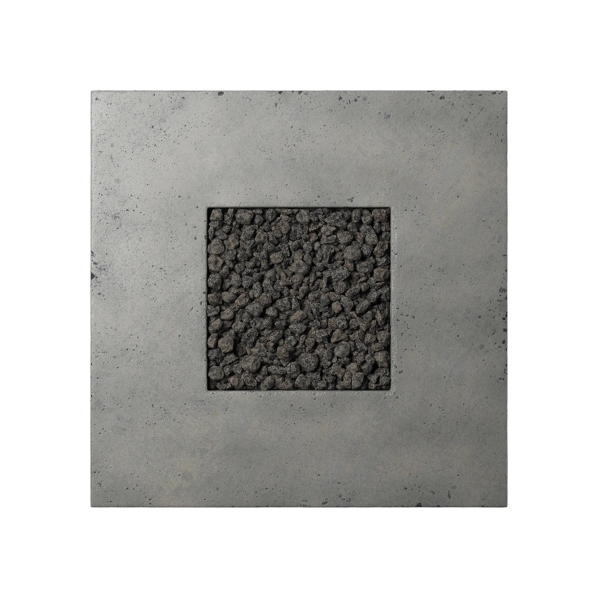 This outdoor fire table is a welcoming centerpiece designed for gathering. Made from glass-reinforced concrete, each piece is naturally finished with deep tones of pewter and dark grey. The monolithic shape is completed with lavastones in the center, bringing together a bold, monochromatic look. Amethyst Home provides interior design, new home construction design consulting, vintage area rugs, and lighting in the Los Angeles metro area.