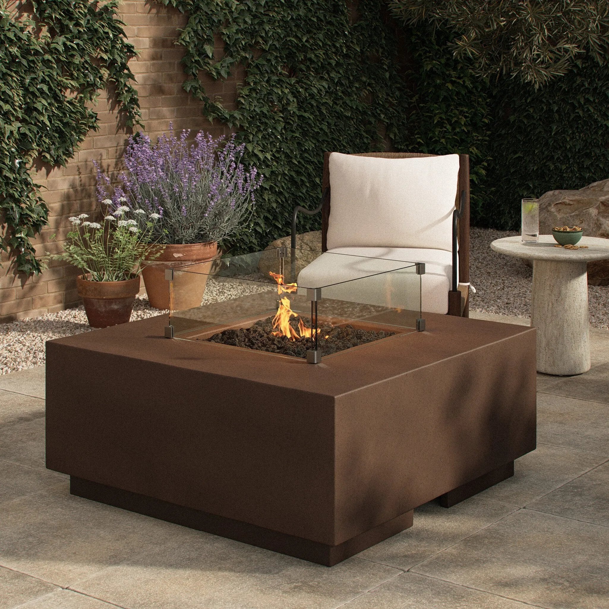 Designed for use in residential and hospitality spaces, this tempered glass wind guard kit is designed to fit the outline shape of the Donovan Outdoor Fire Table. It protects the fire from waning in the wind. Refer to included assembly instructions for correct installation. Amethyst Home provides interior design, new home construction design consulting, vintage area rugs, and lighting in the Houston metro area.