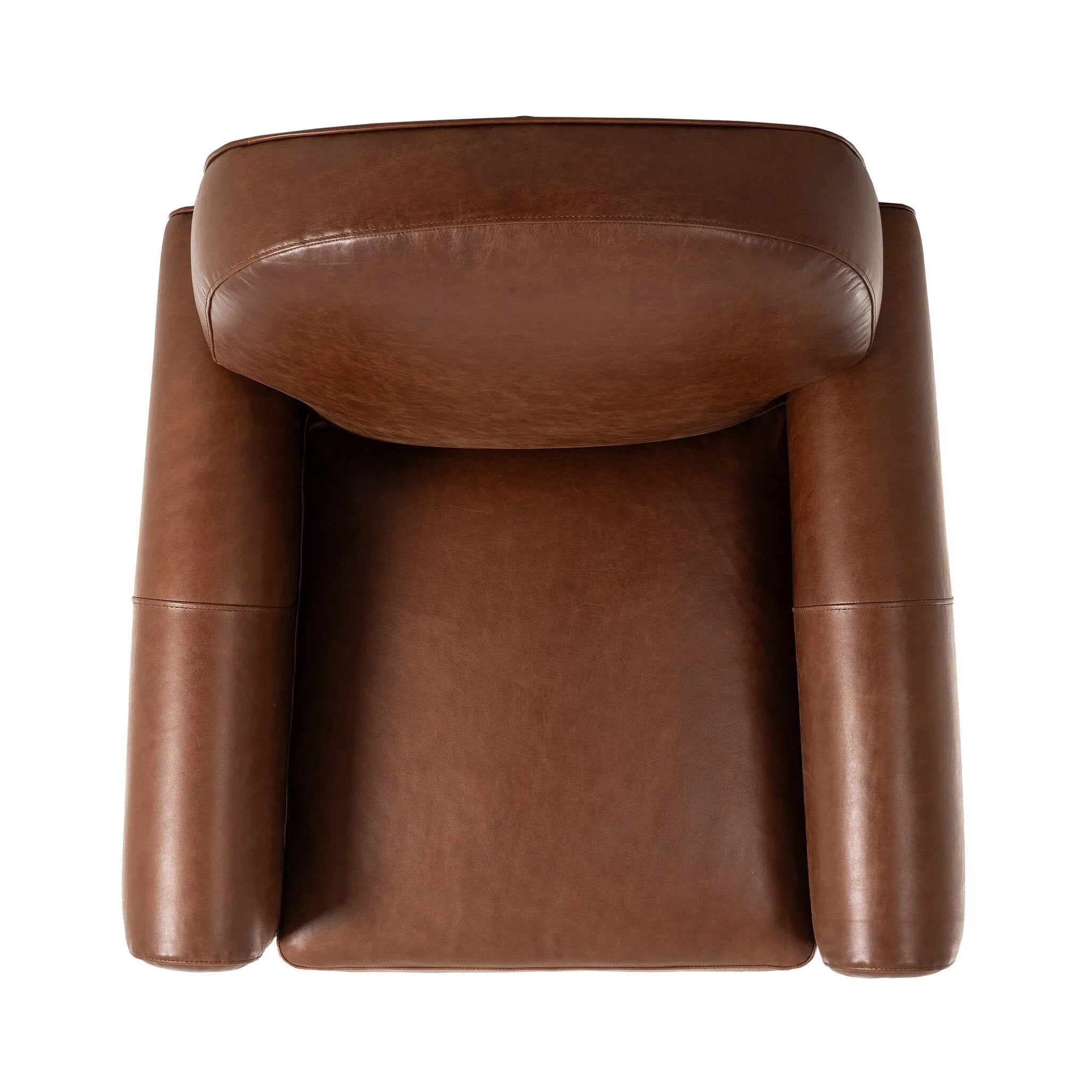 The popular Art Deco club chair makes a comeback. With a prominent curved top, deep seat with a loose cushion, and armrests designed for true relaxation, the armchair invites you to sit back and take it all in. Upholstered in rich mahogany top-grain leather. Amethyst Home provides interior design, new home construction design consulting, vintage area rugs, and lighting in the Boston metro area.