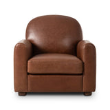 The popular Art Deco club chair makes a comeback. With a prominent curved top, deep seat with a loose cushion, and armrests designed for true relaxation, the armchair invites you to sit back and take it all in. Upholstered in rich mahogany top-grain leather. Amethyst Home provides interior design, new home construction design consulting, vintage area rugs, and lighting in the Houston metro area.