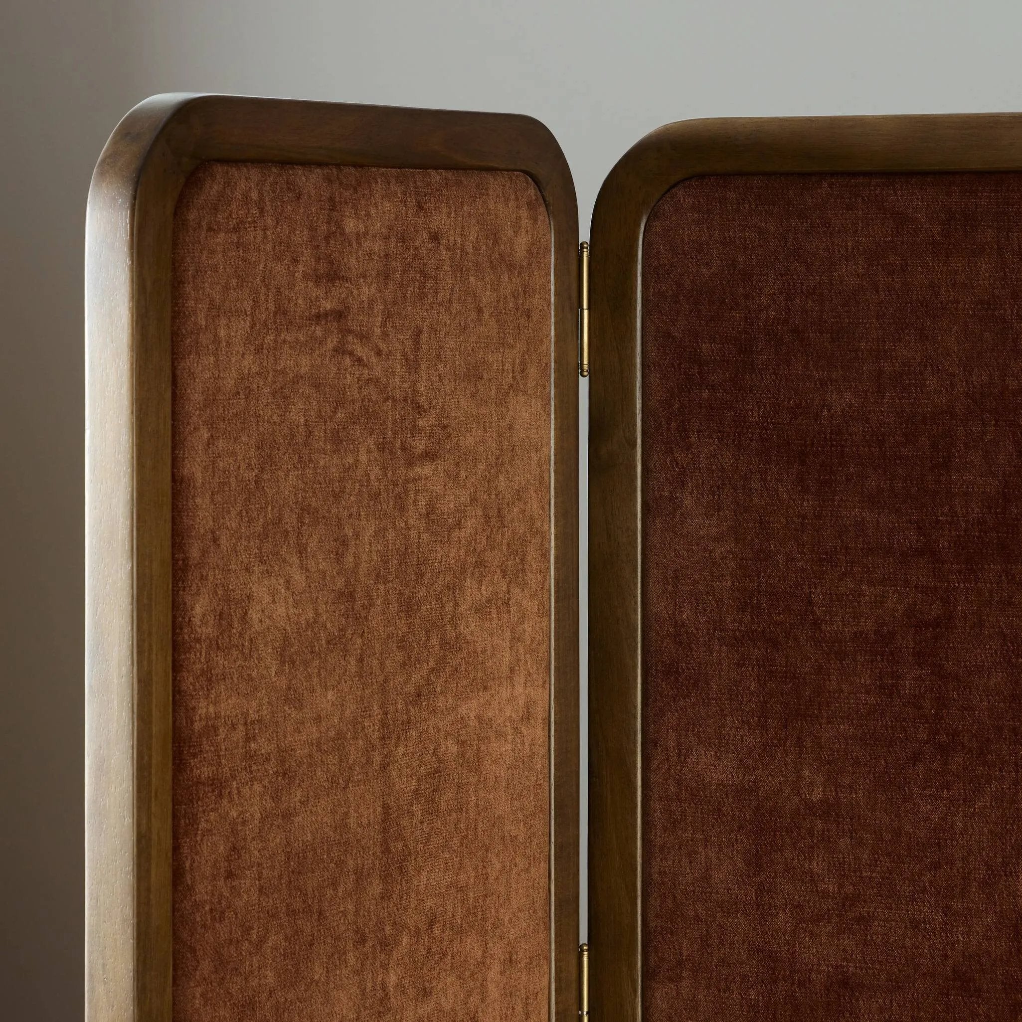 Featuring Duane Vintage Parawood Room Divider by Four Hands at Amethyst Home. Add privacy where you need it with a vintage-inspired room divider. Three long panels are upholstered in a rich rust-colored chenille and framed out by warm parawood. Overall Dimensions: 72.00"w x 1.50"d x 73.00"h. Amethyst Home provides interior design, new home construction design consulting, vintage area rugs, and lighting in the Charlotte metro area.