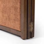 Featuring Duane Vintage Parawood Room Divider by Four Hands at Amethyst Home. Add privacy where you need it with a vintage-inspired room divider. Three long panels are upholstered in a rich rust-colored chenille and framed out by warm parawood. Overall Dimensions: 72.00"w x 1.50"d x 73.00"h. Amethyst Home provides interior design, new home construction design consulting, vintage area rugs, and lighting in the Houston metro area.