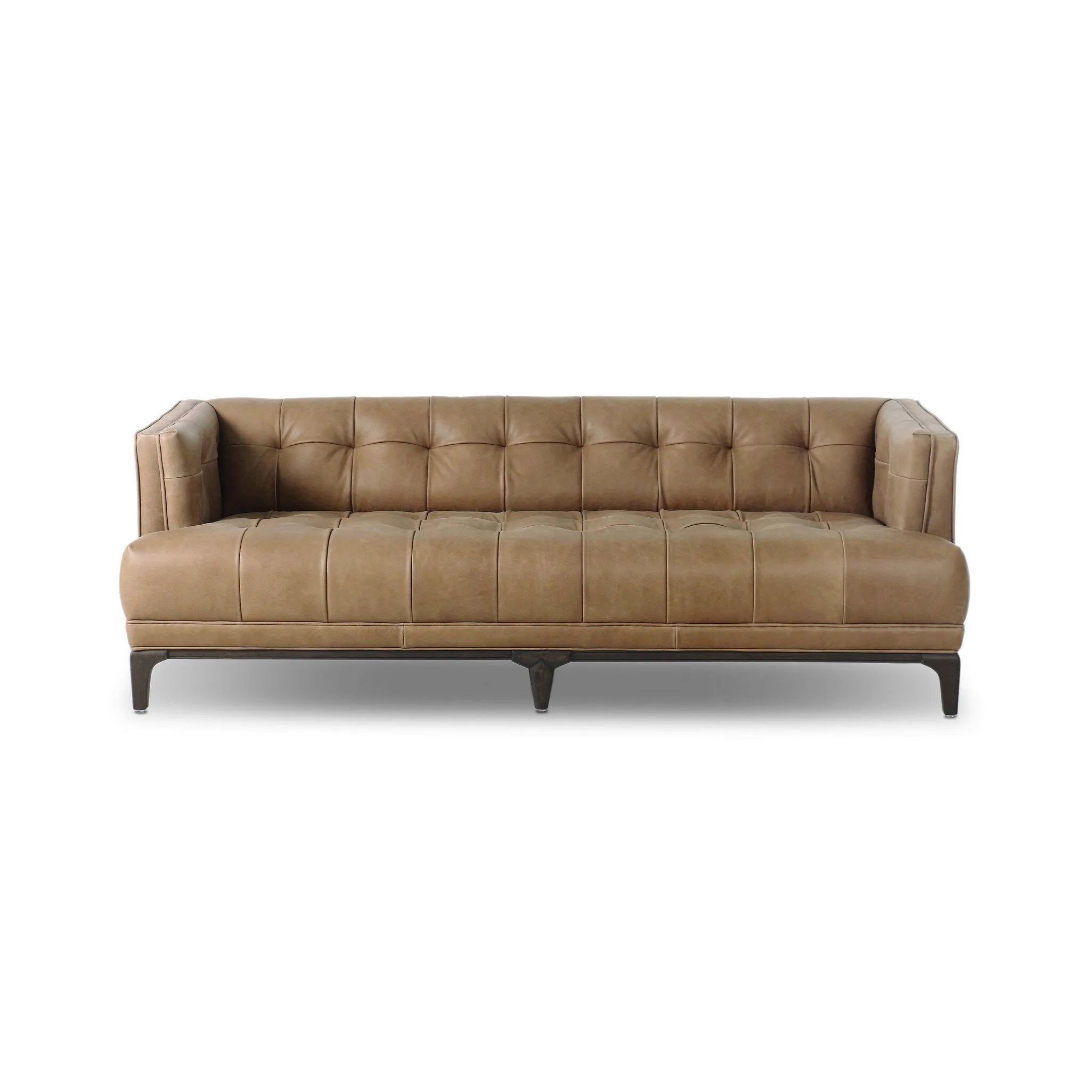 A modernized midcentury silhouette meets the traditional Chesterfield sofa, all in a compact profile perfect for smaller spaces. Top-grain leather in a tan hue, button tufting and a smooth touch bring deep comfort to lounging Amethyst Home provides interior design, new home construction design consulting, vintage area rugs, and lighting in the Des Moines metro area.