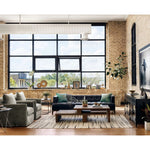 A modernized midcentury silhouette meets the traditional Chesterfield sofa, all in a compact profile perfect for smaller spaces. Top-grain leather in a classic black, button tufting and a smooth touch bring deep comfort to lounging Amethyst Home provides interior design, new home construction design consulting, vintage area rugs, and lighting in the Washington metro area.