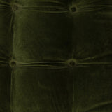 A modernized midcentury silhouette meets the traditional Chesterfield sofa, all in a compact profile perfect for smaller spaces. Smooth velvet in an olive hue, button tufting and a soft touch bring deep comfort to lounging Amethyst Home provides interior design, new home construction design consulting, vintage area rugs, and lighting in the Austin metro area.