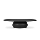 Anchor your space in shape with a beautifully contoured coffee table of worn black resin designed to mimic oak. Rounded oval top features reverse bullnose edging for a design-forward touch Amethyst Home provides interior design, new home construction design consulting, vintage area rugs, and lighting in the Salt Lake City metro area.