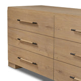 Simple and spacious, this oak dresser has six drawers paired with aged bronze and wood hardware. Waterfall shaping and soft-close undermount glides give a smooth finish Amethyst Home provides interior design, new home construction design consulting, vintage area rugs, and lighting in the Charlotte metro area.