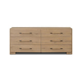 Simple and spacious, this oak dresser has six drawers paired with aged bronze and wood hardware. Waterfall shaping and soft-close undermount glides give a smooth finish Amethyst Home provides interior design, new home construction design consulting, vintage area rugs, and lighting in the Park City metro area.