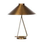 An antique brass iron dome is polished and finished with a perforated edge all around to bring a dose of industrial styling to this midcentury-inspired table lamp Amethyst Home provides interior design, new home construction design consulting, vintage area rugs, and lighting in the Boston metro area.