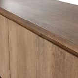 A clean-styled media console made from warm, grain-rich oak. Six doors feature subtle finger grooves for easy open. Gentle curves soften up the look, while a floating design keeps things feeling light and fresh. Inside, generous shelving awaits storage of media and more. Amethyst Home provides interior design, new home construction design consulting, vintage area rugs, and lighting in the Nashville metro area.