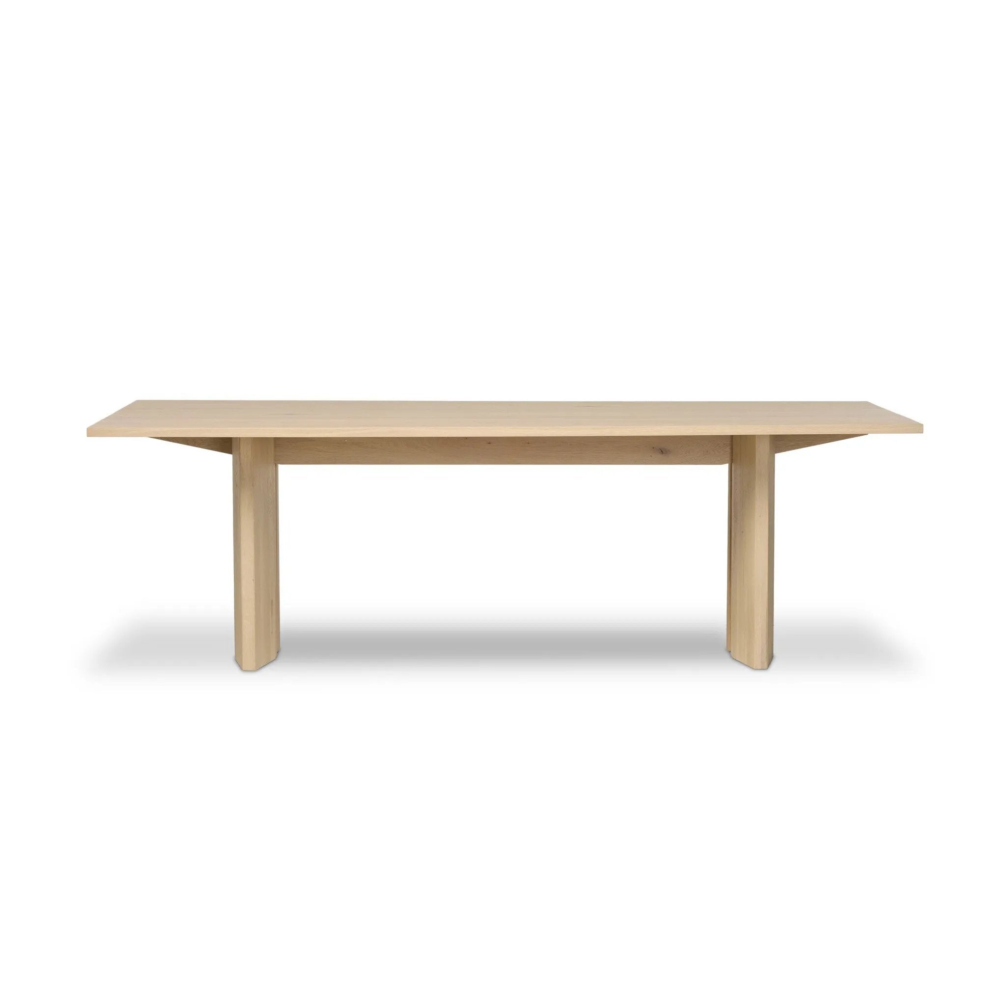 Thoughtful design details takes this long, linear dining table to the next level. Tapered shaping creates a clean, angular profile on the base, with splice leg detailing bringing a design-forward look to the whole piece. Fully crafted from bleached oak sourced from Romania. Amethyst Home provides interior design, new home construction design consulting, vintage area rugs, and lighting in the Winter Garden metro area.