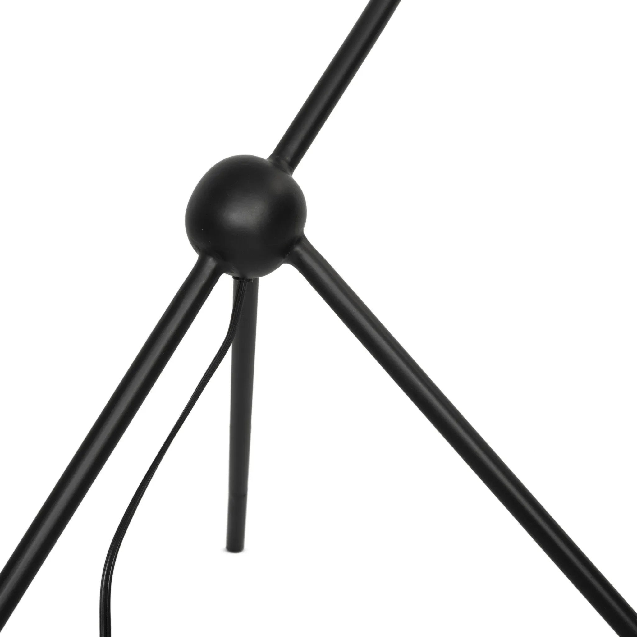 A dramatically curved silhouette and tripod base of matte black metal pair with a flax linen shade for this floor lamp's shapely, minimalist feel Amethyst Home provides interior design, new home construction design consulting, vintage area rugs, and lighting in the Salt Lake City metro area.