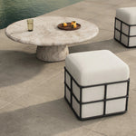 Inspired by traditional rattan forms, this outdoor stool is reimagined in a contemporary material palette that leans into the French garden aesthetic. With a grid-like take on the barrel silhouette, an ironwork frame features cross-hatch details. Cover or store inside during inclement weather and when not in use. Amethyst Home provides interior design, new home construction design consulting, vintage area rugs, and lighting in the Boston metro area.