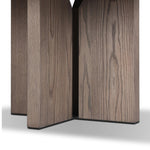 Inspired by minimalist Nordic design, a grey-finished oak dining table has a base of four plinth legs for a simple but impactful detail Amethyst Home provides interior design, new home construction design consulting, vintage area rugs, and lighting in the Boston metro area.