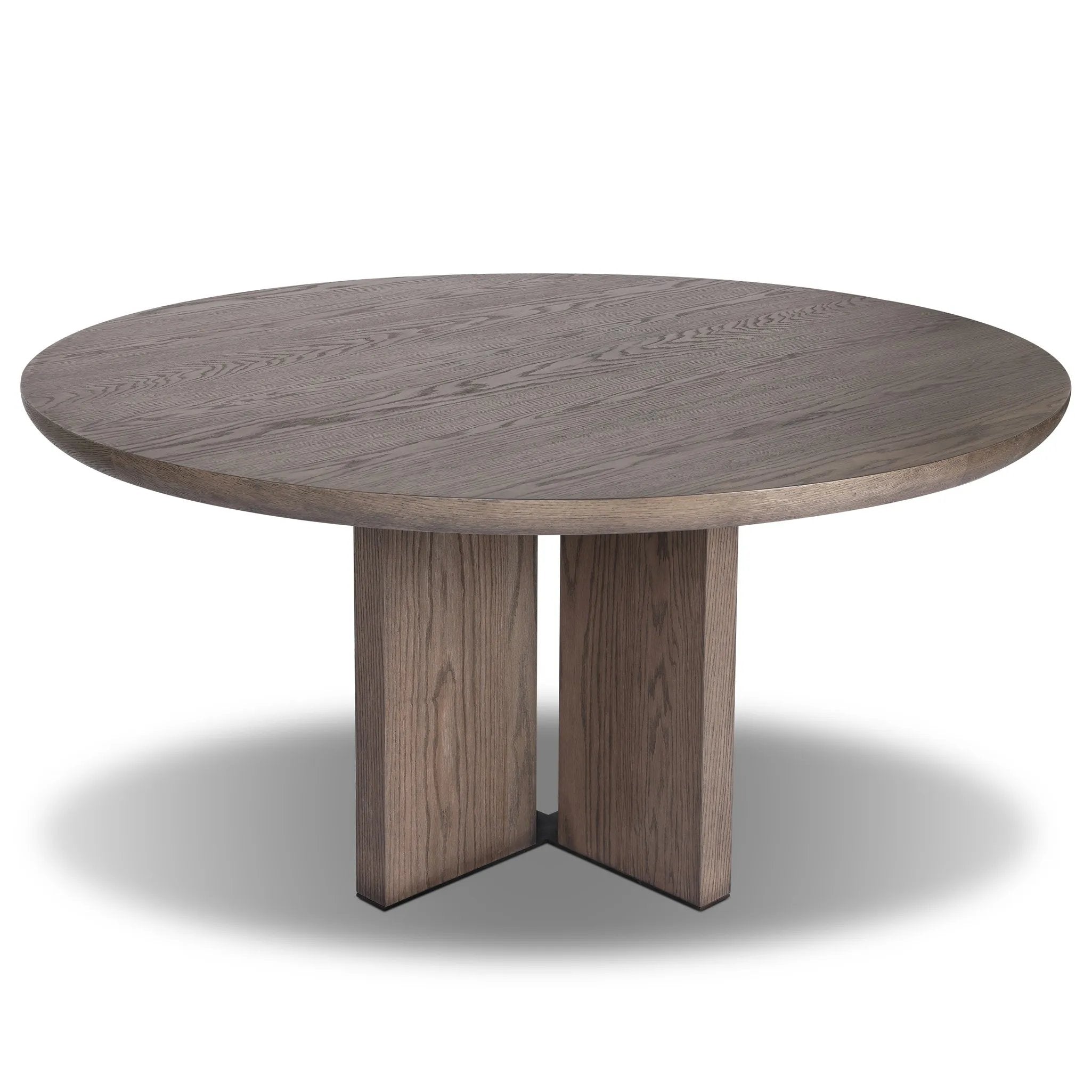 Inspired by minimalist Nordic design, a grey-finished oak dining table has a base of four plinth legs for a simple but impactful detail Amethyst Home provides interior design, new home construction design consulting, vintage area rugs, and lighting in the Park City metro area.