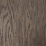 Inspired by minimalist Nordic design, a grey-finished oak dining table has a base of four plinth legs for a simple but impactful detail Amethyst Home provides interior design, new home construction design consulting, vintage area rugs, and lighting in the Salt Lake City metro area.