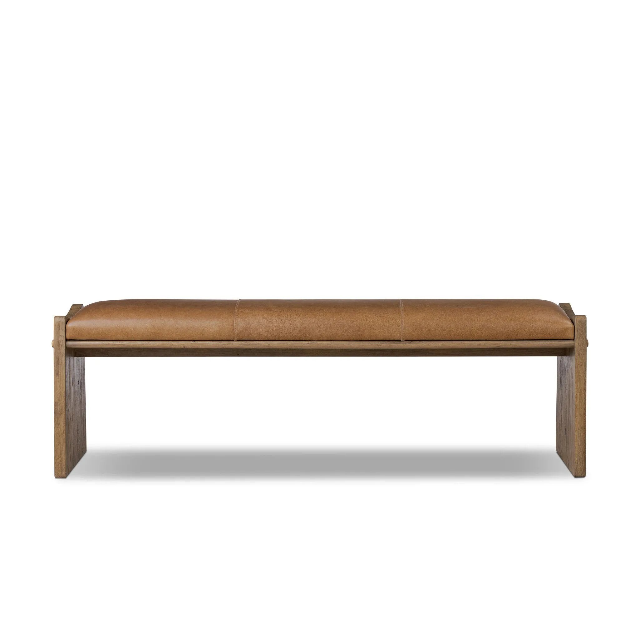 Top-grain leather and worn, solid oak fuse for a substantial, streamlined bench inspired by Nordic Minimalism Amethyst Home provides interior design, new home construction design consulting, vintage area rugs, and lighting in the Austin metro area.