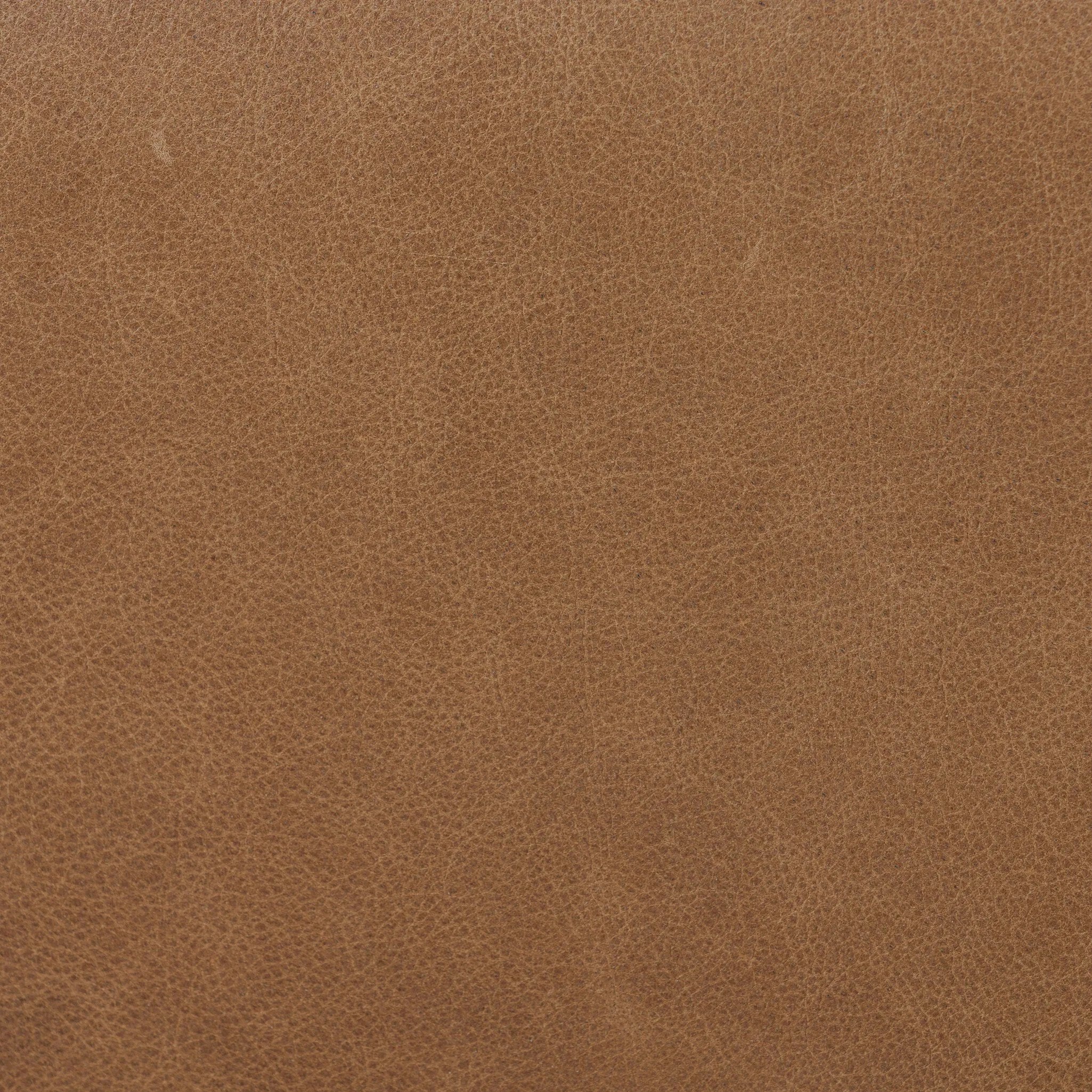 Top-grain leather and worn, solid oak fuse for a substantial, streamlined bench inspired by Nordic Minimalism Amethyst Home provides interior design, new home construction design consulting, vintage area rugs, and lighting in the Portland metro area.