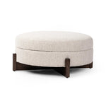 Featuring Esben Sattley Fog Storage Ottoman by Four Hands at Amethyst Home. Get extra storage and an extra spot for lounging or propped feet in one. This coffee table-sized storage ottoman features a loose top to store extra blankets and more. Upholstered in a textural boucle-like performance fabric, perfect for everyday messes. Finished with an X-frame par. Amethyst Home provides interior design, new home construction design consulting, vintage area rugs, and lighting in the Nashville metro area.