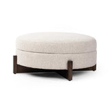 Featuring Esben Sattley Fog Storage Ottoman by Four Hands at Amethyst Home. Get extra storage and an extra spot for lounging or propped feet in one. This coffee table-sized storage ottoman features a loose top to store extra blankets and more. Upholstered in a textural boucle-like performance fabric, perfect for everyday messes. Finished with an X-frame par. Amethyst Home provides interior design, new home construction design consulting, vintage area rugs, and lighting in the Nashville metro area.