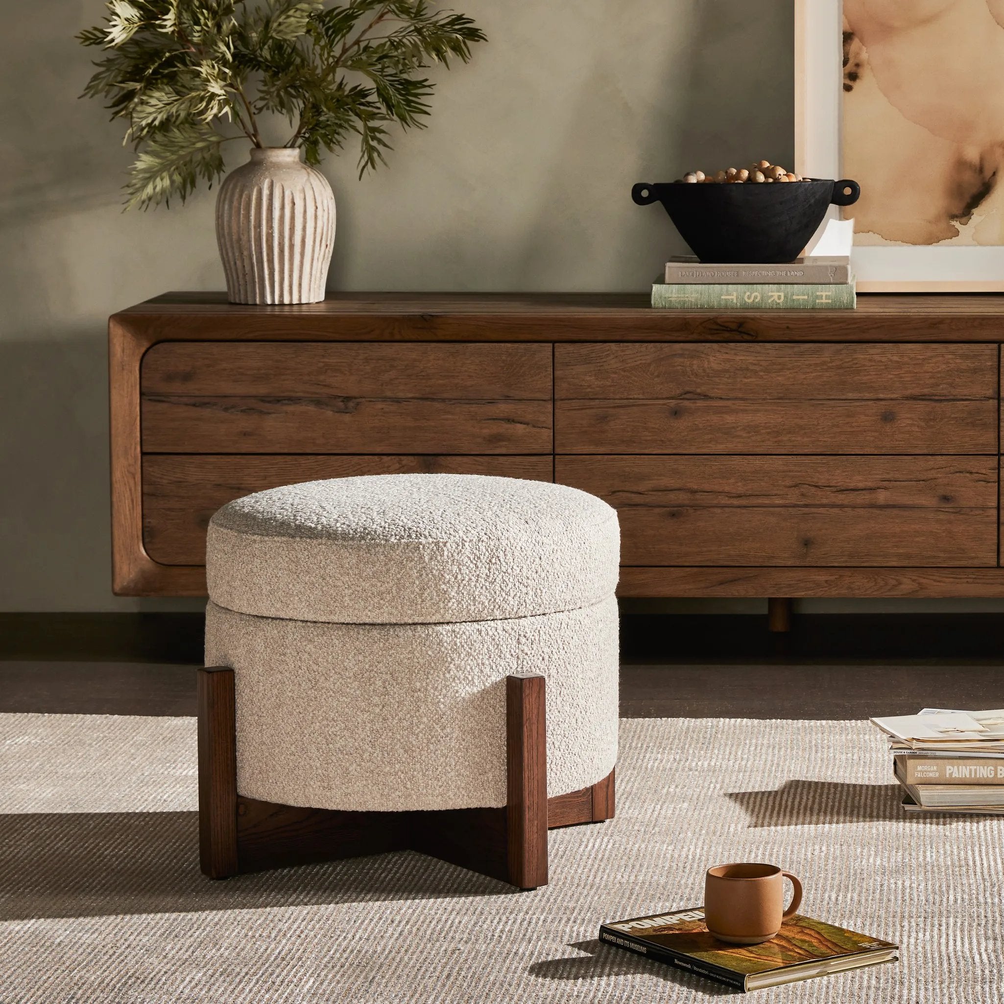 Featuring Esben Sattley Fog Storage Ottoman by Four Hands at Amethyst Home. Get extra storage and an extra spot for lounging or propped feet in one. This coffee table-sized storage ottoman features a loose top to store extra blankets and more. Upholstered in a textural boucle-like performance fabric, perfect for everyday messes. Finished with an X-frame paraw. Amethyst Home provides interior design, new home construction design consulting, vintage area rugs, and lighting in the Seattle metro area.