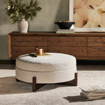 Featuring Esben Sattley Fog Storage Ottoman by Four Hands at Amethyst Home. Get extra storage and an extra spot for lounging or propped feet in one. This coffee table-sized storage ottoman features a loose top to store extra blankets and more. Upholstered in a textural boucle-like performance fabric, perfect for everyday messes. Finished with an X-frame parawoo. Amethyst Home provides interior design, new home construction design consulting, vintage area rugs, and lighting in the Tampa metro area.