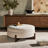 Featuring Esben Sattley Fog Storage Ottoman by Four Hands at Amethyst Home. Get extra storage and an extra spot for lounging or propped feet in one. This coffee table-sized storage ottoman features a loose top to store extra blankets and more. Upholstered in a textural boucle-like performance fabric, perfect for everyday messes. Finished with an X-frame parawoo. Amethyst Home provides interior design, new home construction design consulting, vintage area rugs, and lighting in the Tampa metro area.