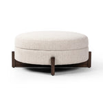 Featuring Esben Sattley Fog Storage Ottoman by Four Hands at Amethyst Home. Get extra storage and an extra spot for lounging or propped feet in one. This coffee table-sized storage ottoman features a loose top to store extra blankets and more. Upholstered in a textural boucle-like performance fabric, perfect for everyday messes. Finished with an X-frame pa. Amethyst Home provides interior design, new home construction design consulting, vintage area rugs, and lighting in the Washington metro area.