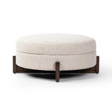 Featuring Esben Sattley Fog Storage Ottoman by Four Hands at Amethyst Home. Get extra storage and an extra spot for lounging or propped feet in one. This coffee table-sized storage ottoman features a loose top to store extra blankets and more. Upholstered in a textural boucle-like performance fabric, perfect for everyday messes. Finished with an X-frame pa. Amethyst Home provides interior design, new home construction design consulting, vintage area rugs, and lighting in the Washington metro area.
