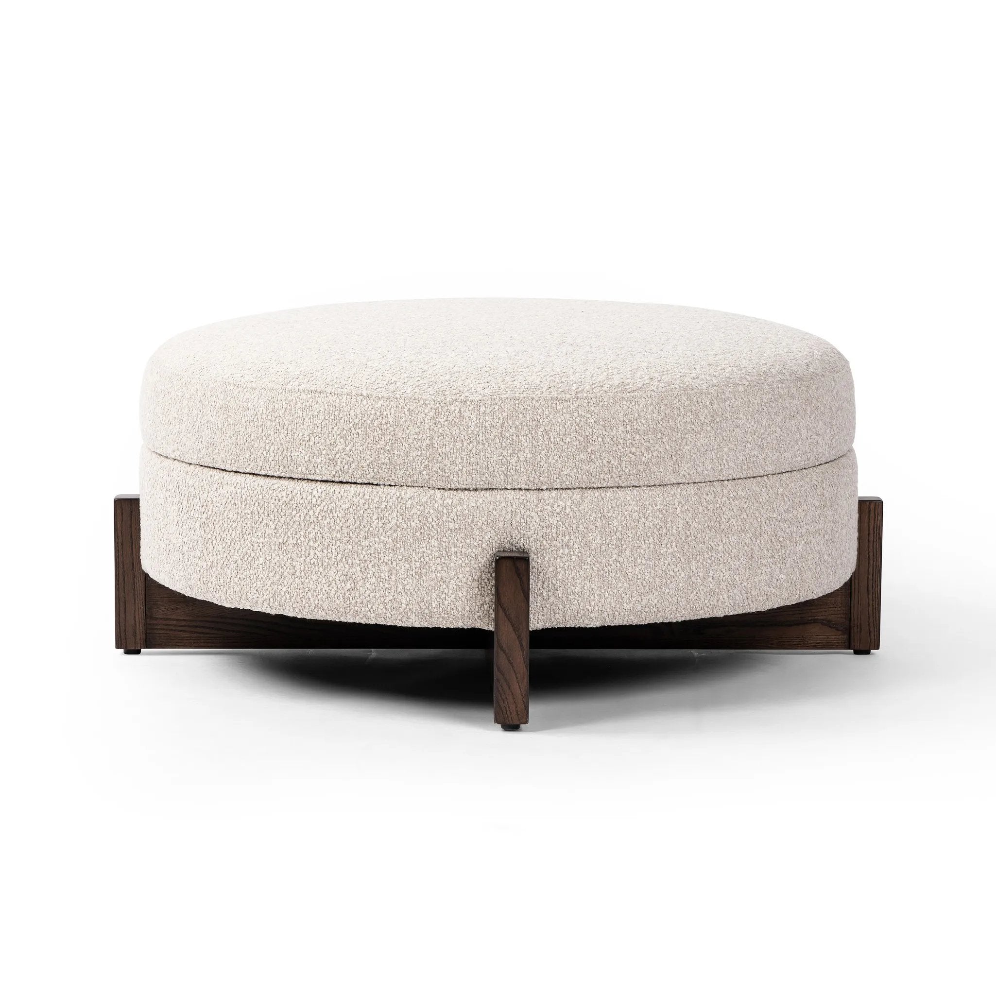 Featuring Esben Sattley Fog Storage Ottoman by Four Hands at Amethyst Home. Get extra storage and an extra spot for lounging or propped feet in one. This coffee table-sized storage ottoman features a loose top to store extra blankets and more. Upholstered in a textural boucle-like performance fabric, perfect for everyday messes. Finished with an X-frame pa. Amethyst Home provides interior design, new home construction design consulting, vintage area rugs, and lighting in the Washington metro area.