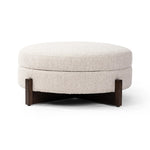 Featuring Esben Sattley Fog Storage Ottoman by Four Hands at Amethyst Home. Get extra storage and an extra spot for lounging or propped feet in one. This coffee table-sized storage ottoman features a loose top to store extra blankets and more. Upholstered in a textural boucle-like performance fabric, perfect for everyday messes. Finished with an X-frame. Amethyst Home provides interior design, new home construction design consulting, vintage area rugs, and lighting in the Winter Garden metro area.