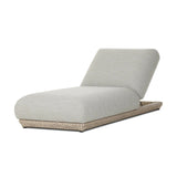 Play with contrast — in shape, material and proportion. Generous, sink-in cushioning sits atop a small, tapered woven plinth base, with structured upholstery with heavy texture inviting a comfortable sit on this outdoor chaise. Cover or store indoors during inclement weather and when not in use. Amethyst Home provides interior design, new home construction design consulting, vintage area rugs, and lighting in the Tampa metro area.