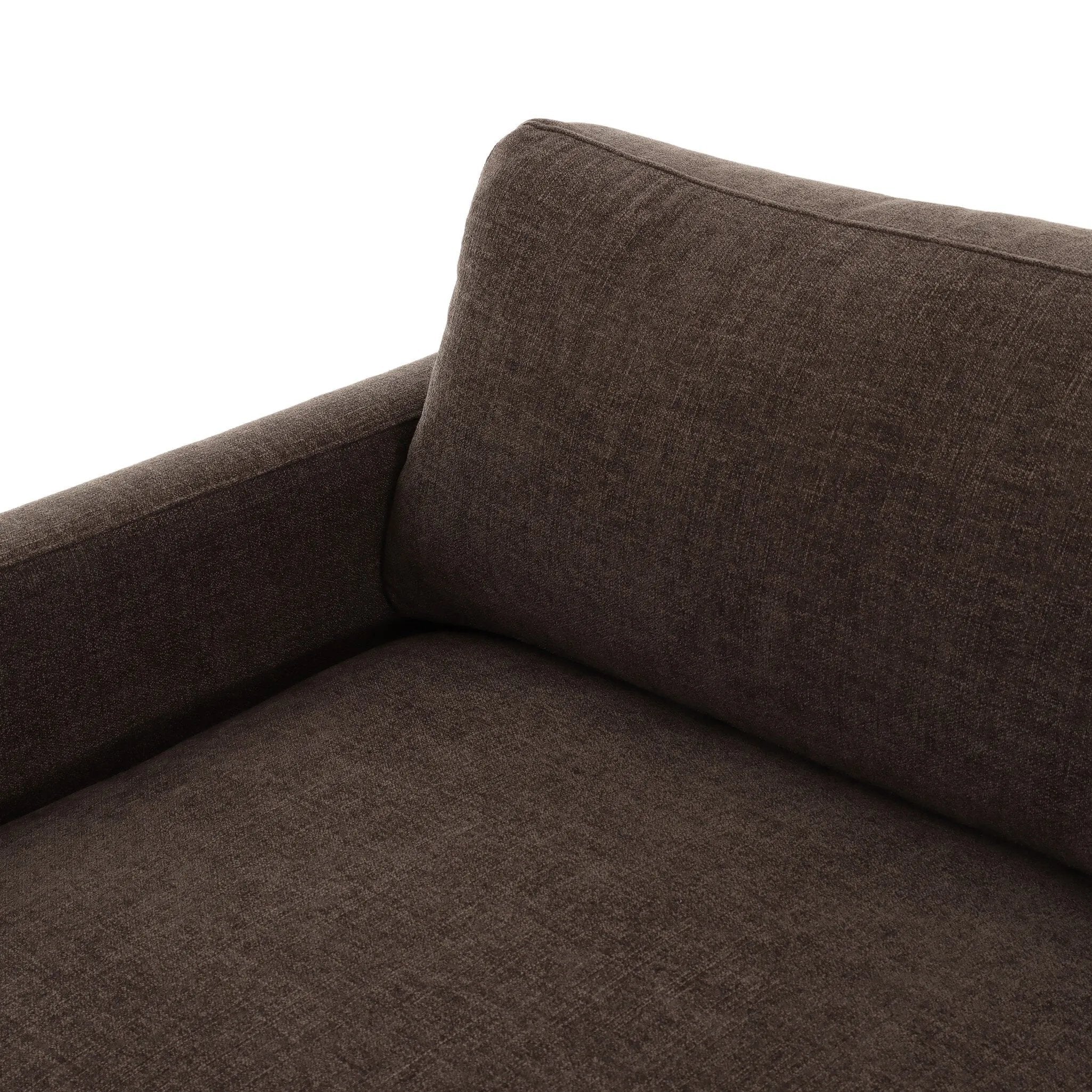 Classic goes contemporary. A brown-finished parawood base supports low, deep seating of high-performance fabric, with track arms for a clean touch.As enthusiasts of natural aesthetics at Amethyst, we love the warm modern inspired Everly Sofa - Landale Charcoal. This item pairs well with other brands such as Ethnicraft and is perfect for loft homes Amethyst Home provides interior design, new home construction design consulting, vintage area rugs, and lighting in the Dallas metro area.