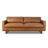 Classic goes contemporary. A brown-finished wood base supports low, deep seating of high-top-grain leather, with track arms for a clean touch.As fans of organic modern style at Amethyst, we love the nature inspired Everly Sofa - Sonoma Chestnut. This item pairs well with other brands such as Visual Comfort and is perfect for modern homes Amethyst Home provides interior design, new home construction design consulting, vintage area rugs, and lighting in the Alpharetta metro area.