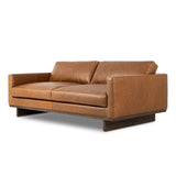 Classic goes contemporary. A brown-finished wood base supports low, deep seating of high-top-grain leather, with track arms for a clean touch.As fans of organic modern style at Amethyst, we love the nature inspired Everly Sofa - Sonoma Chestnut. This item pairs well with other brands such as Visual Comfort and is perfect for modern homes Amethyst Home provides interior design, new home construction design consulting, vintage area rugs, and lighting in the Monterey metro area.
