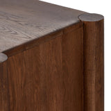 Cocoa-finished oak, organic carving and cylinder legs fuse for  a primitive look, while wood's varying grain colors add unique character to each piece.Collection: Aide Amethyst Home provides interior design, new home construction design consulting, vintage area rugs, and lighting in the Austin metro area.