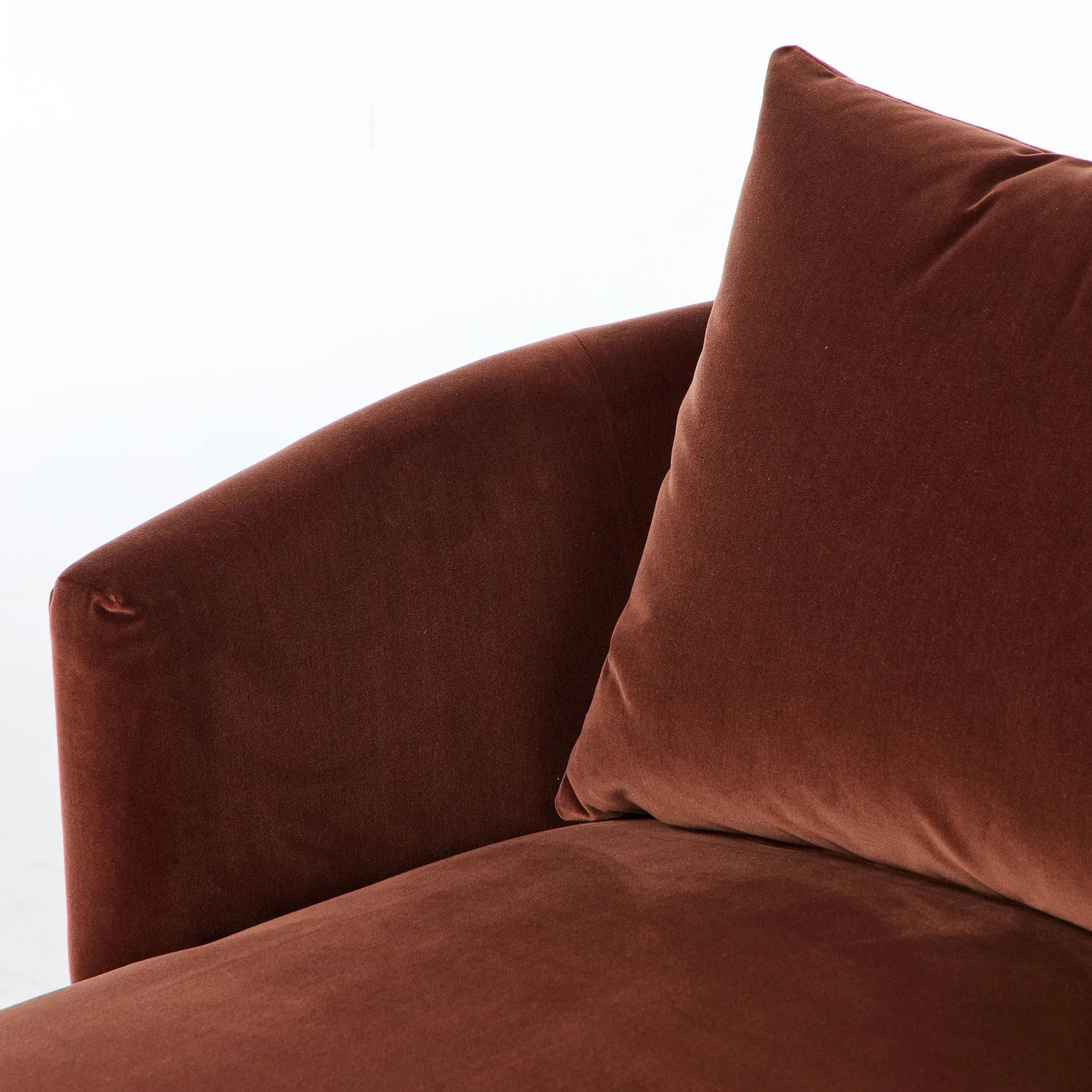 Casual and sculpted, velvety auburn fabric and a pill-shaped chaise take this lounger to the next level Amethyst Home provides interior design, new home construction design consulting, vintage area rugs, and lighting in the Nashville metro area.