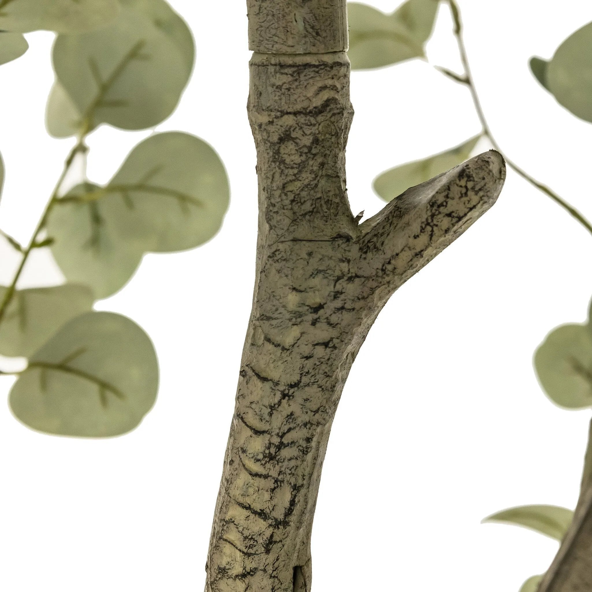 High-quality construction crafts the branches and disc-shaped leaves of this faux eucalyptus tree, for a realistic look that's designed for easy living. Ships in a black plastic liner pot. For indoor use only Amethyst Home provides interior design, new home construction design consulting, vintage area rugs, and lighting in the Seattle metro area.