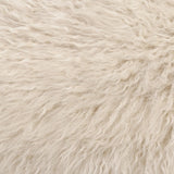 A textural take on a timeless silhouette. Hammered iron frames a squared seat and bolster back upholstered in off-white Mongolian fur Amethyst Home provides interior design, new home construction design consulting, vintage area rugs, and lighting in the Tampa metro area.