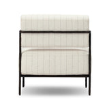 A slim take on a timeless silhouette. Hammered iron frames a squared seat and bolster back upholstered in striped, neutral fabric. Cover or store inside during inclement weather and when not in use.As enthusiasts of organic modern style at Amethyst, we love the nature inspired Fenn Outdoor Chair - Amalfi Natural. Amethyst Home provides interior design, new home construction design consulting, vintage area rugs, and lighting in the Laguna Beach metro area.