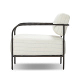 A slim take on a timeless silhouette. Hammered iron frames a squared seat and bolster back upholstered in striped, neutral fabric. Cover or store inside during inclement weather and when not in use.As enthusiasts of organic modern style at Amethyst, we love the nature inspired Fenn Outdoor Chair - Amalfi Natural. Amethyst Home provides interior design, new home construction design consulting, vintage area rugs, and lighting in the San Diego metro area.