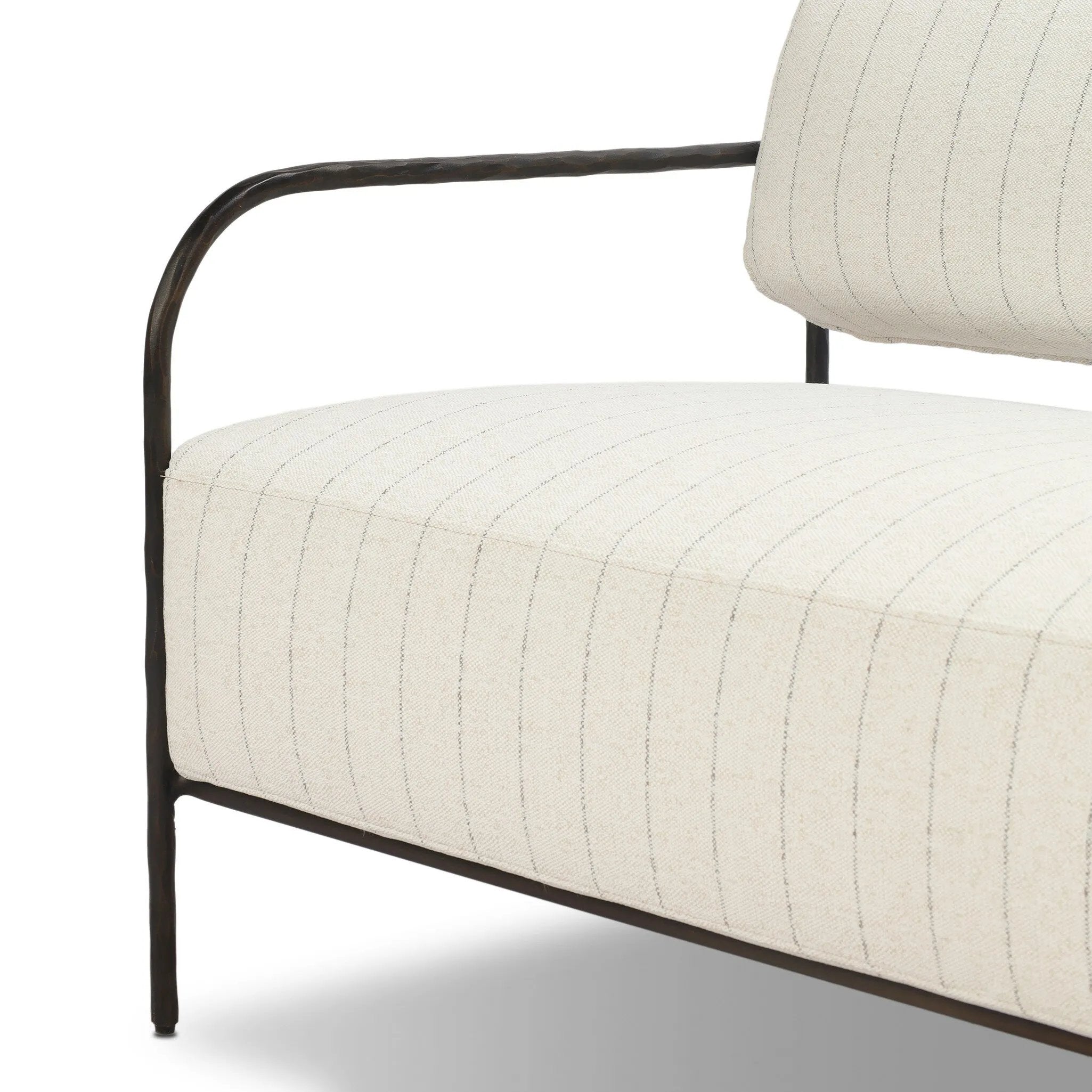 A slim take on a timeless silhouette. Hammered iron frames a squared seat and bolster back upholstered in striped, neutral fabric. Cover or store inside during inclement weather and when not in use.As enthusiasts of modern design at Amethyst, we love the nature inspired Fenn Outdoor Sofa-78" - Amalfi Natural. Amethyst Home provides interior design, new home construction design consulting, vintage area rugs, and lighting in the Los Angeles metro area.