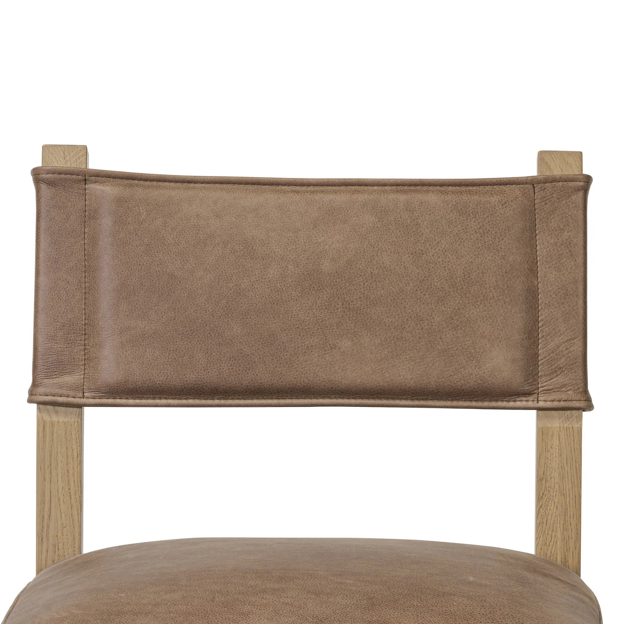 Featuring Ferris Palermo Cigar Bar + Counter Stool by Four Hands at Amethyst Home. Perfectly sized for the counter, black-finished parawood frames squared seating of high-performance fabric, with black top-grain leather backing. Performance fabrics are specially created to withstand spills, stains, high traffic and wear, ensuring long-term comfort and unmatche. Amethyst Home provides interior design, new home construction design consulting, vintage area rugs, and lighting in the Boston metro area.