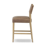 Featuring Ferris Palermo Cigar Bar + Counter Stool by Four Hands at Amethyst Home. Perfectly sized for the counter, black-finished parawood frames squared seating of high-performance fabric, with black top-grain leather backing. Performance fabrics are specially created to withstand spills, stains, high traffic and wear, ensuring long-term comfort and unmat. Amethyst Home provides interior design, new home construction design consulting, vintage area rugs, and lighting in the Calabasas metro area.