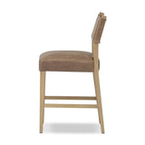 Featuring Ferris Palermo Cigar Bar + Counter Stool by Four Hands at Amethyst Home. Perfectly sized for the counter, black-finished parawood frames squared seating of high-performance fabric, with black top-grain leather backing. Performance fabrics are specially created to withstand spills, stains, high traffic and wear, ensuring long-term comfort and unmat. Amethyst Home provides interior design, new home construction design consulting, vintage area rugs, and lighting in the Calabasas metro area.