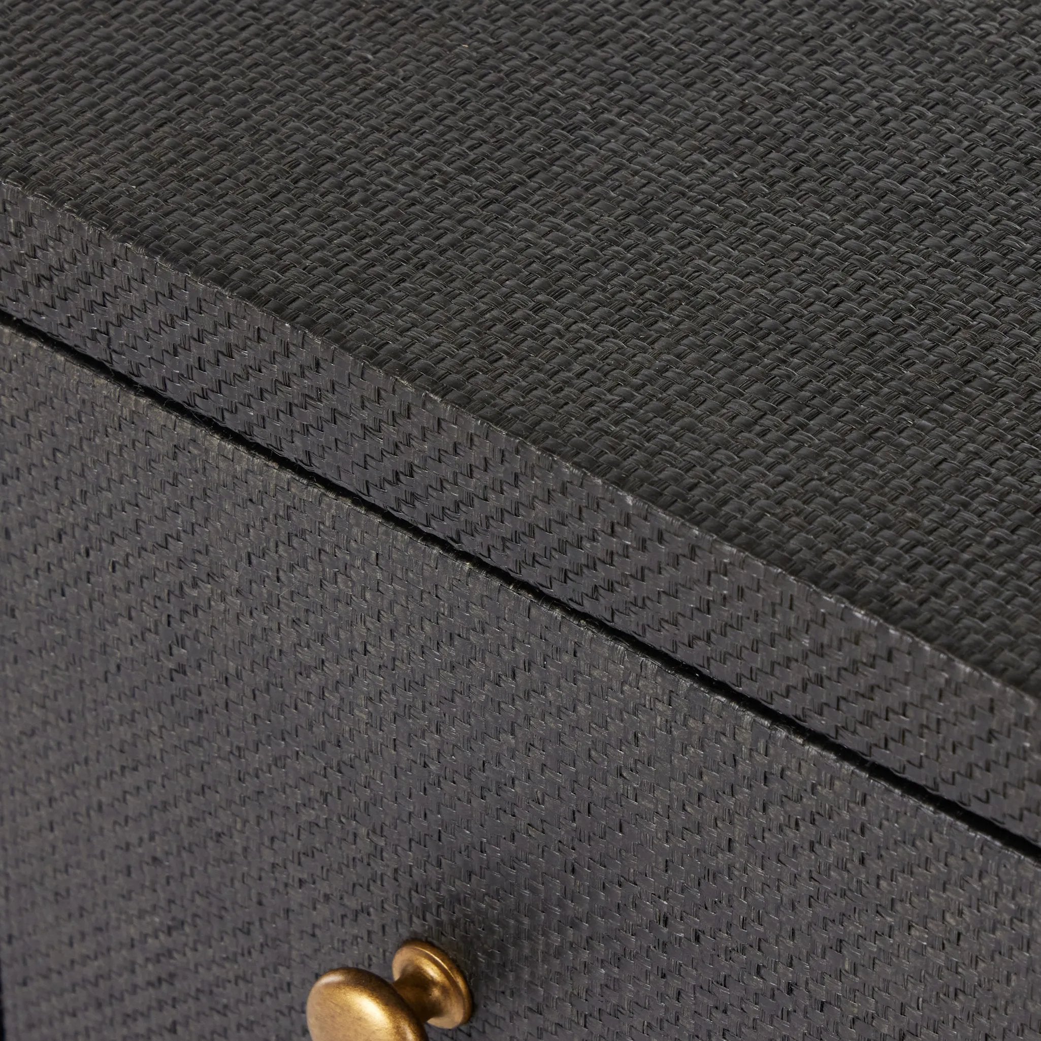 Featuring Fiona Black Raffia Nightstand by Four Hands at Amethyst Home. Woven black raffia offers a texture-driven take on bedside storage. Antique brass-finished iron hardware adorns dual drawers supported by a solid mahogany base.Overall Dimensions: 30.00"w x 17.00"d x 26.50"hWeight : 59.74 lbsMaterials: Sugar Palm, Solid Mahogany, Iron. Amethyst Home provides interior design, new home construction design consulting, vintage area rugs, and lighting in the Tampa metro area.