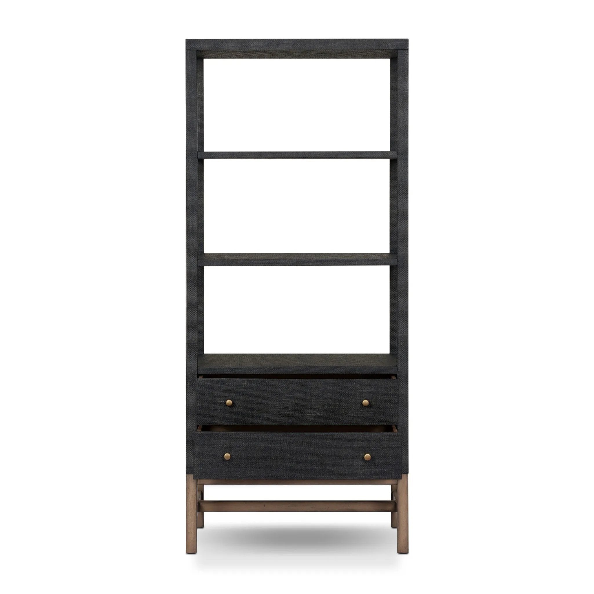 Woven black raffia drawers offer closed storage and a texture-driven take on book shelving. Antique brass-finished hardware adds a touch of vintage detailing, all framed within solid mahogany Amethyst Home provides interior design, new home construction design consulting, vintage area rugs, and lighting in the Omaha metro area.