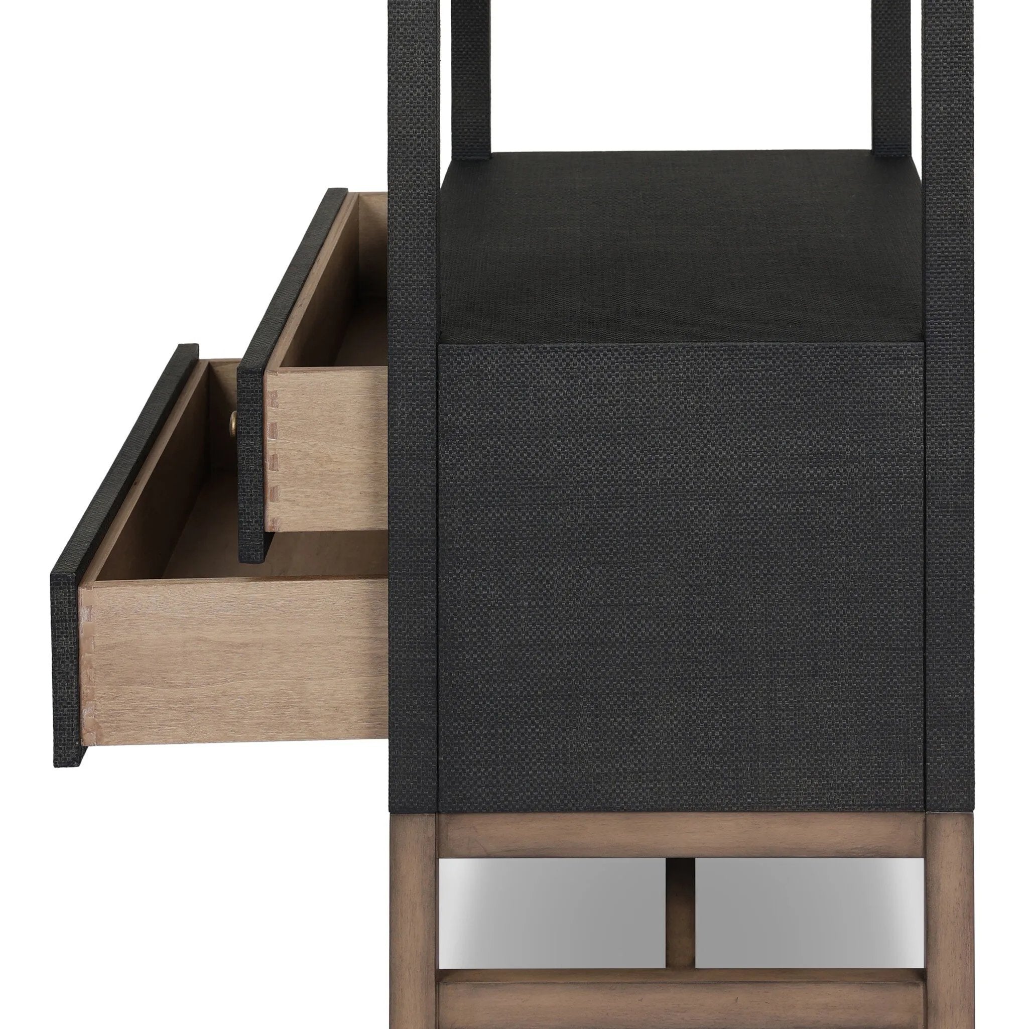 Woven black raffia drawers offer closed storage and a texture-driven take on book shelving. Antique brass-finished hardware adds a touch of vintage detailing, all framed within solid mahogany Amethyst Home provides interior design, new home construction design consulting, vintage area rugs, and lighting in the Scottsdale metro area.