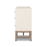 Featuring Fiona Ivory Painted Raffia 6 Drawer Dresser by Four Hands at Amethyst Home. Indulge in luxury with the Fiona Ivory Painted Raffia 6 Drawer Dresser. This elegant dresser boasts a sophisticated ivory painted finish and hand-woven raffia drawers. With six spacious drawers, it offers ample storage space while adding a touch of exclusivity to any bedro. Amethyst Home provides interior design, new home construction design consulting, vintage area rugs, and lighting in the Calabasas metro area.